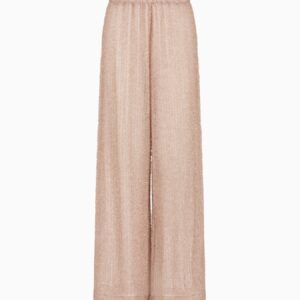 Pantaloni a vita elastica e gamba ampia. Un copricostume dallo spirito grintoso con un tessuto fuzzy a coste in lurex in grado di donare tridimensionalità e un tocco luminoso al capo. Emporio Armani